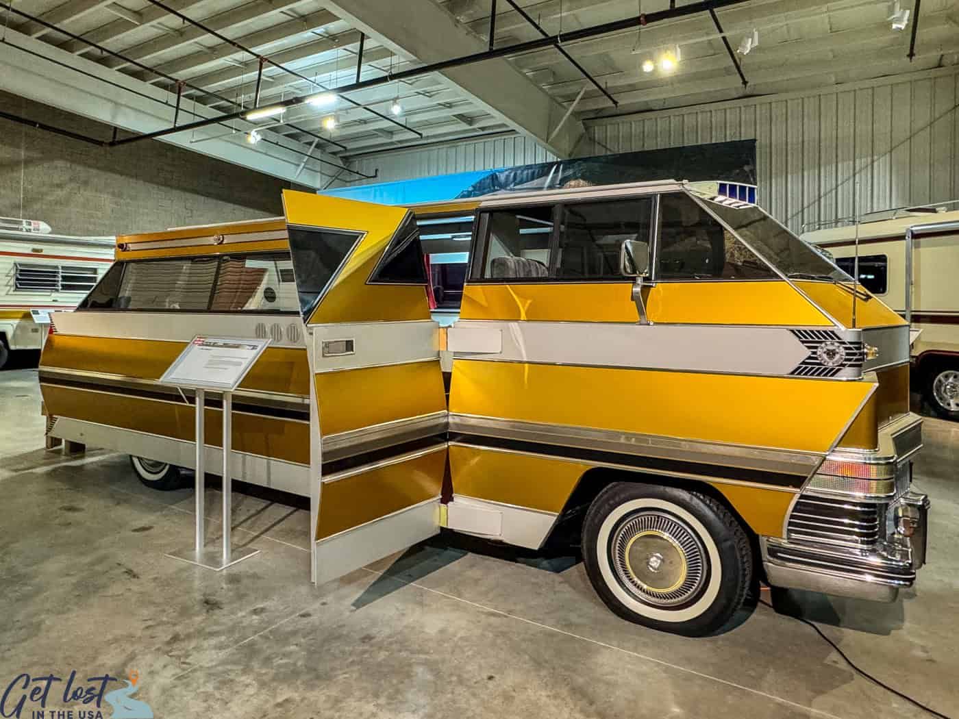 Classic motorhome exhibit inside the RV/MH Hall of Fame Museum.